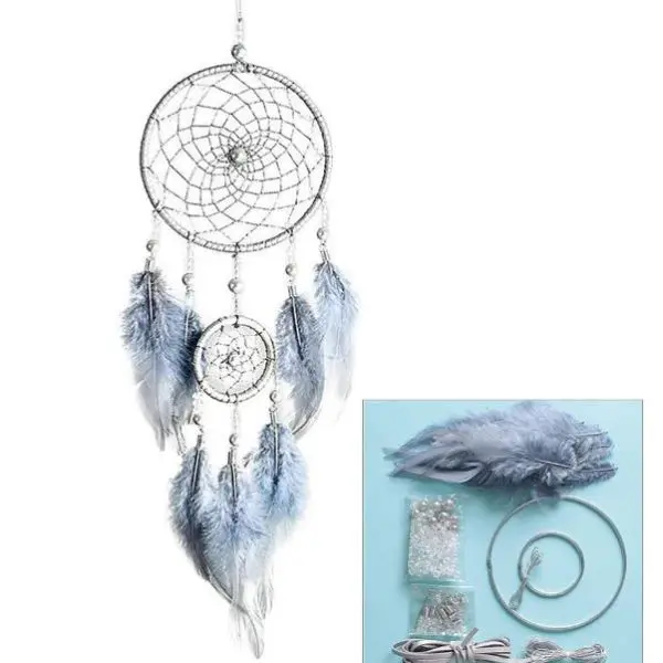 Immerse yourself in the artistry of our DIY Dream Catcher Add-On Kit, a must-have for craft enthusiasts and spirituality seekers alike. This exquisite set includes a stunning white and light blue dream catcher, meticulously designed with a large circular web interwoven with intricate blue beads and delicate feathers, destined to captivate your imagination. Hanging below is an elegant smaller web decorated with an array of vibrant feathers that add a splash of color and movement. Enhance your crafting experience with an included inset showcasing all essential materials: premium quality feathers, sparkling beads, durable threads, and sturdy metal rings—all elegantly presented against a soothing light blue backdrop. Perfect for adding a touch of tranquility and mystique to any room while honing your DIY skills.