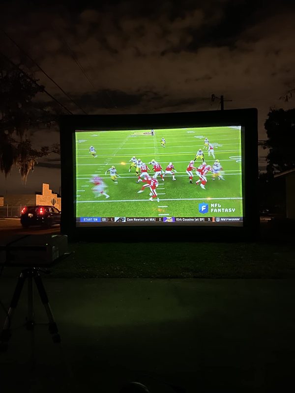 An **Outdoor Teepee Movie Party!** features a football game being projected onto a screen at night. The image shows a play in progress with players in red and white jerseys on the field, adding to the excitement of the evening.